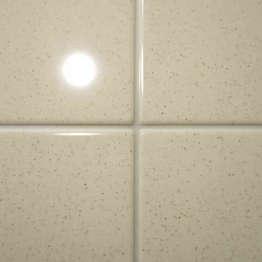 Glossy ceramic tile surface shows how zircon sand purity influences glaze smoothness.
